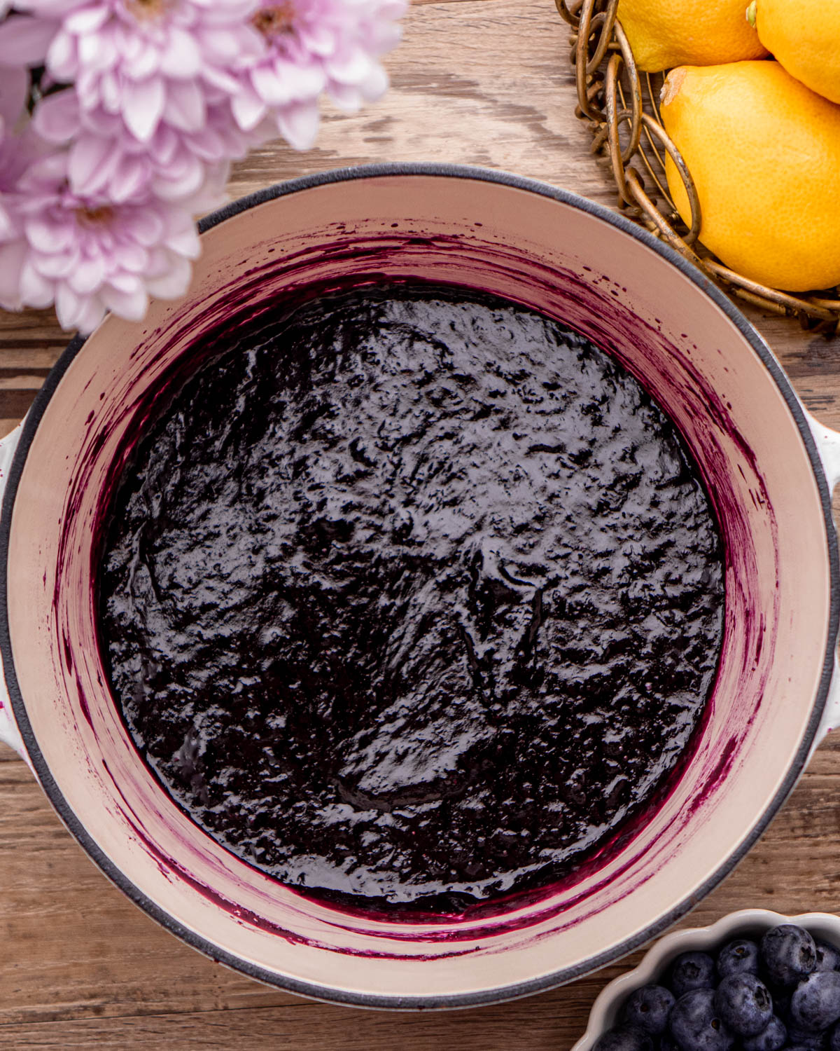 thickened blueberry jam in a white pot