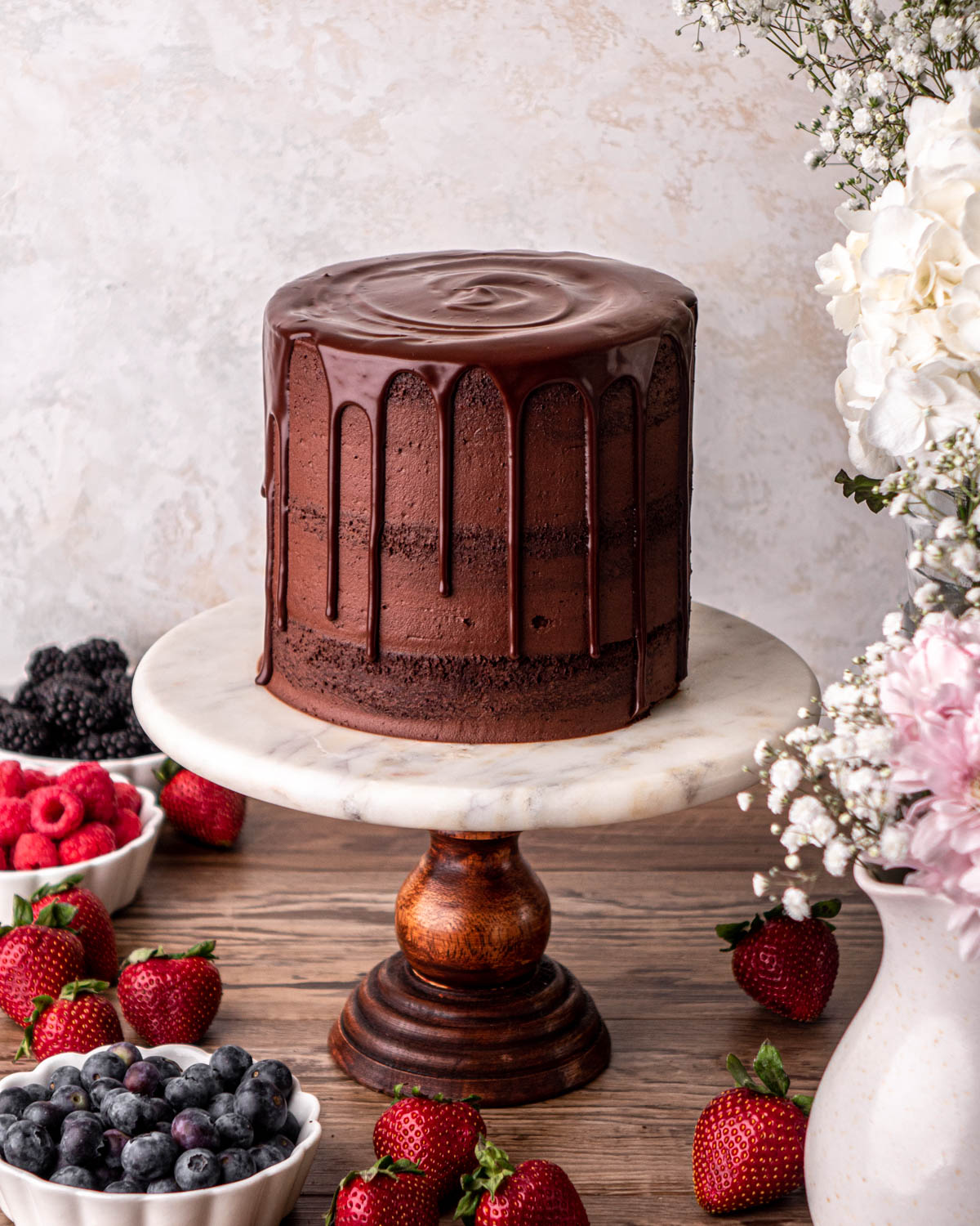 chocolate cake with chocolate ganache drip on it