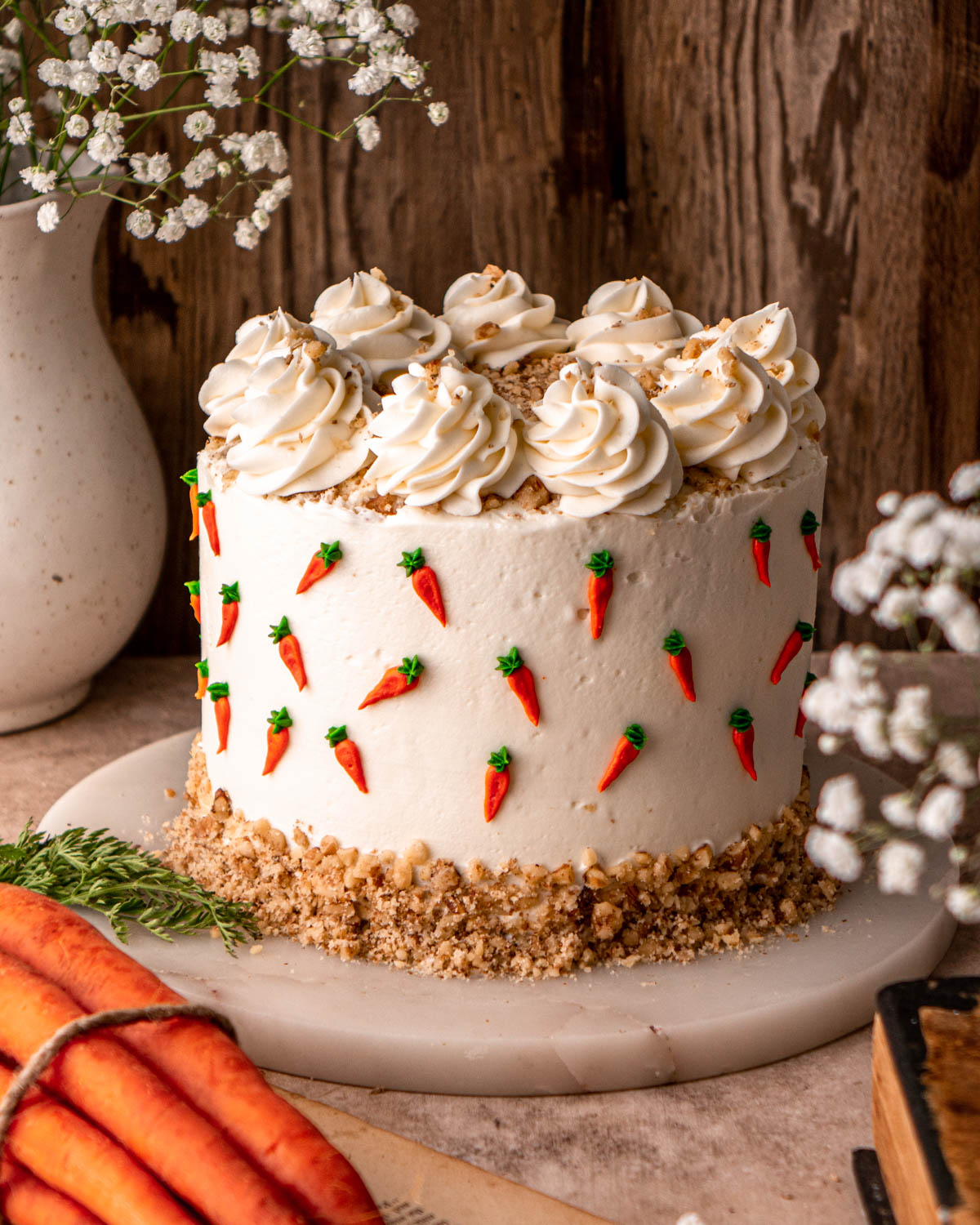 carrot cake decorated with mini carrots 