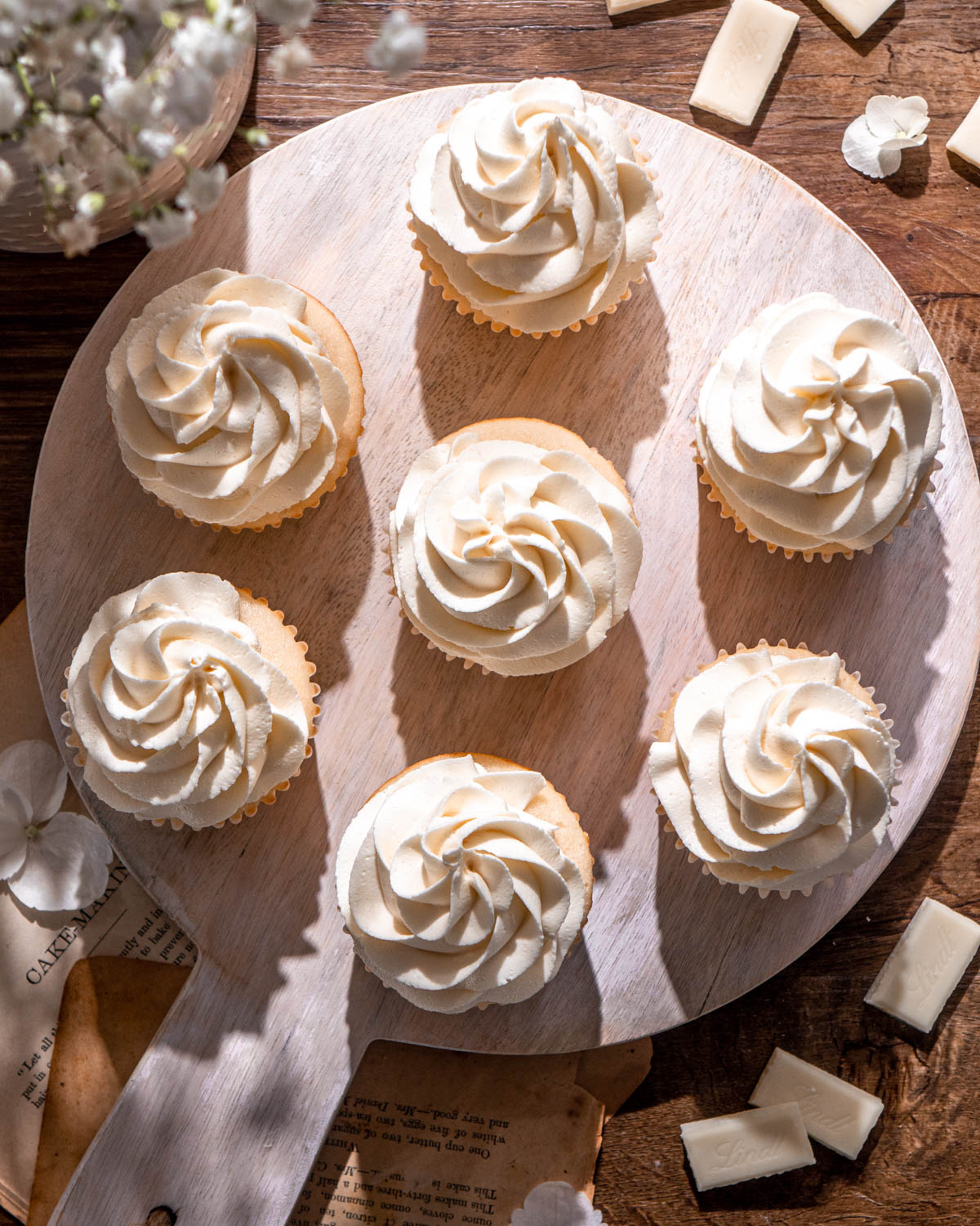 cupcakes topped with white chocolate buttercream