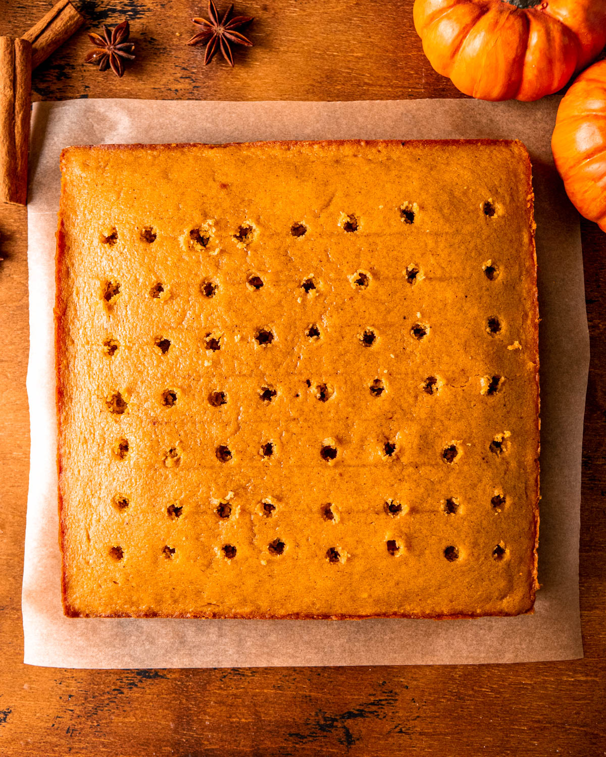 pumpkin cake poked with holes