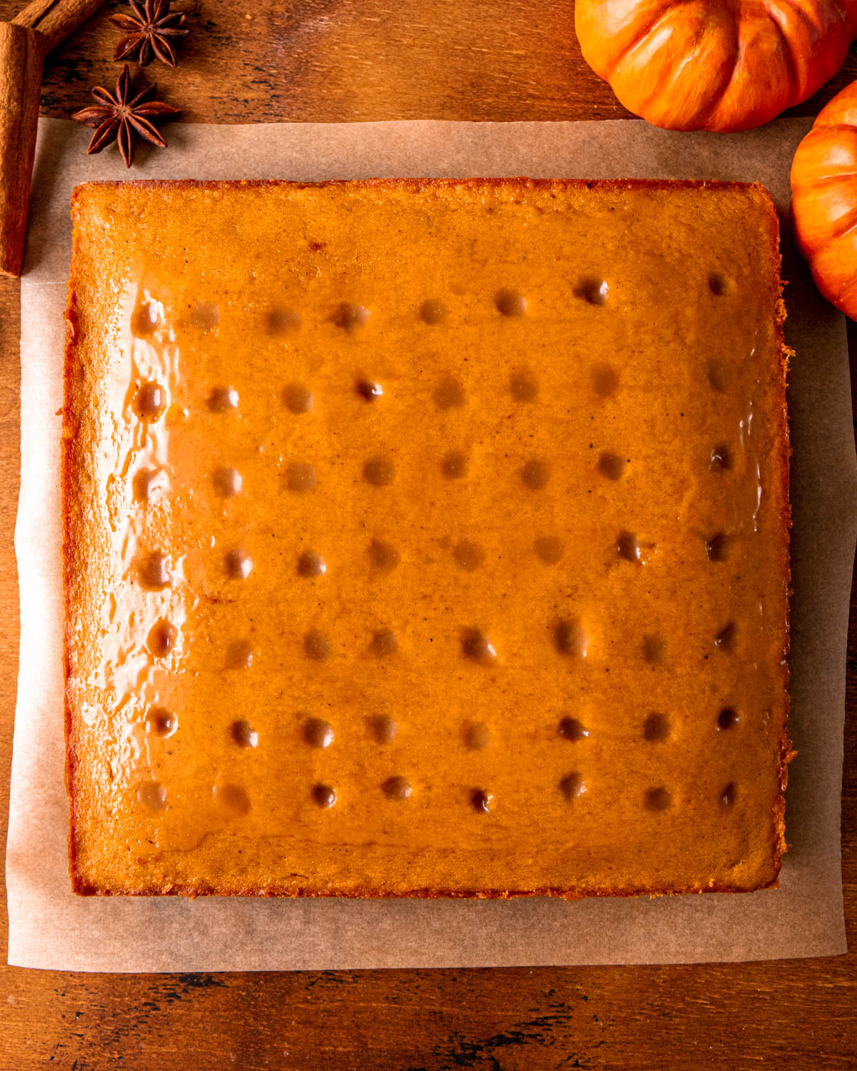 pumpkin cake with holes filled with caramel 