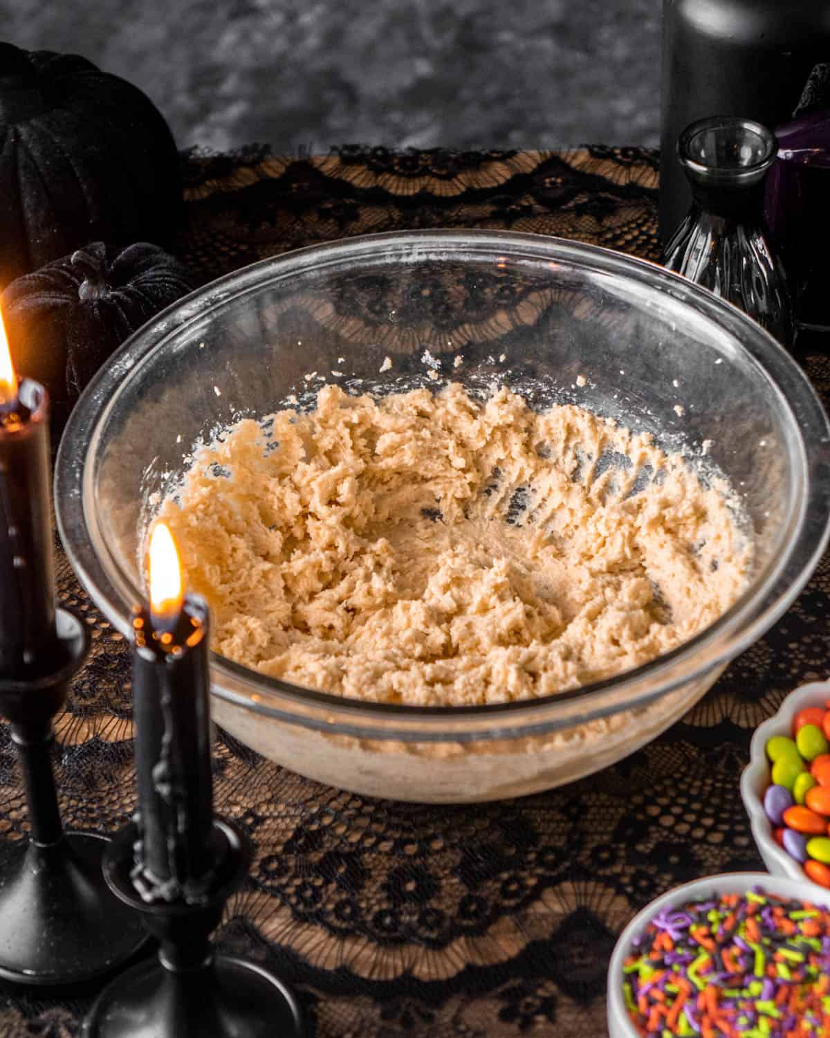 butter and sugars creamed together in a glass bowl