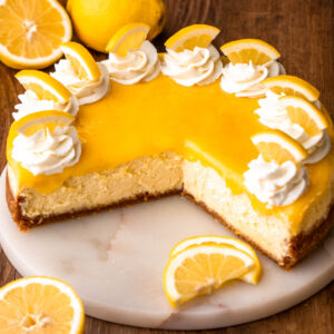 lemon cheesecake cut open on a marble tray