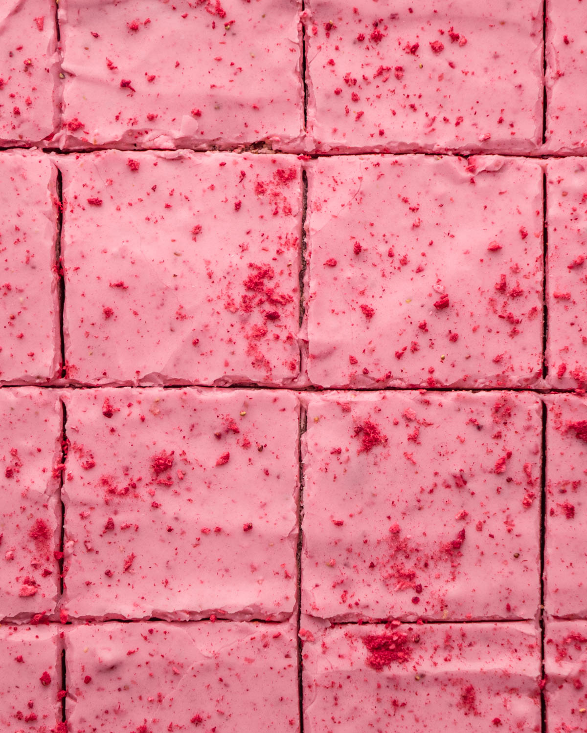 close up of top of cut strawberry brownies