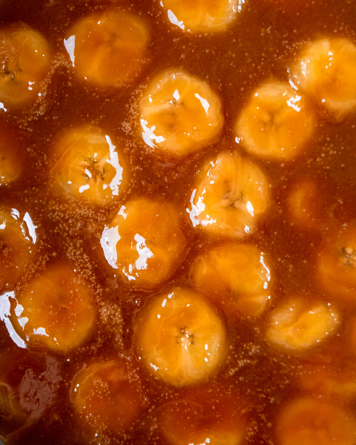 close up of bananas foster topping in pan