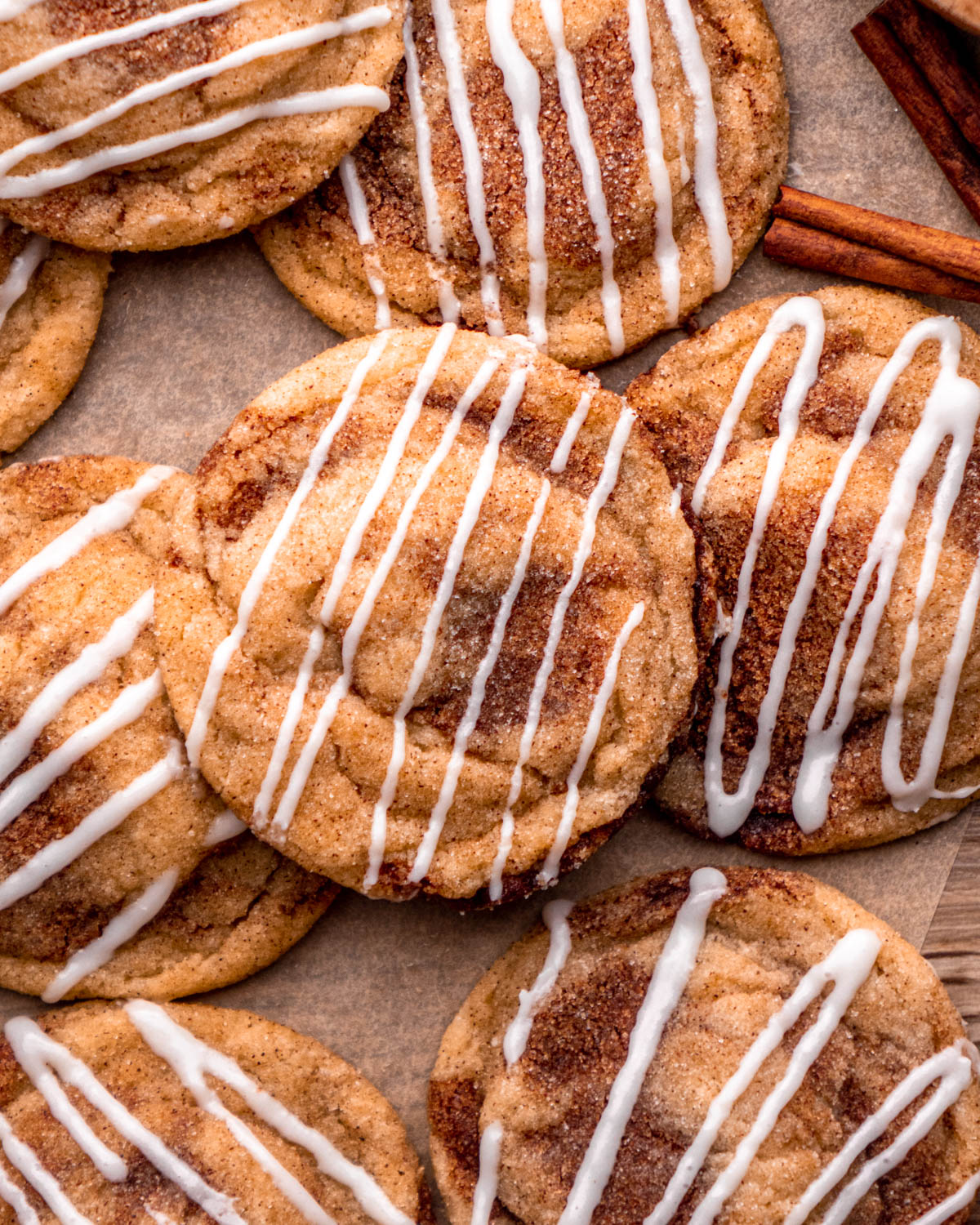 cinnamon roll cookies arranged on parchment paper